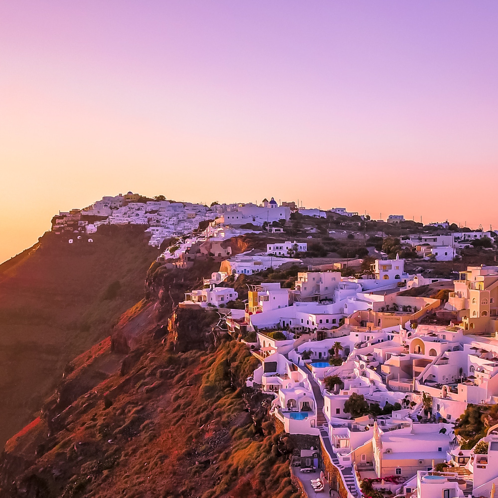 sunset over mountaintop Greek village